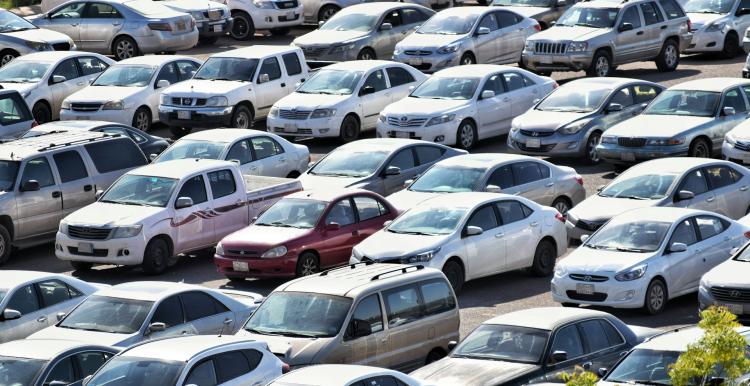 Multiple cars parked in a car park