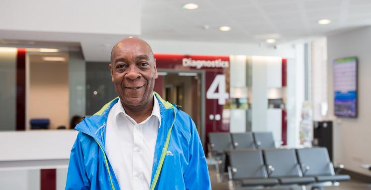 Man standing in a hospital Man standing in a hospital