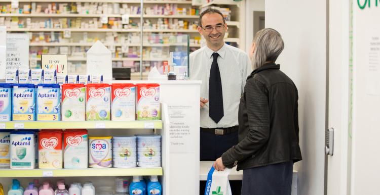 two people at the pharmacy