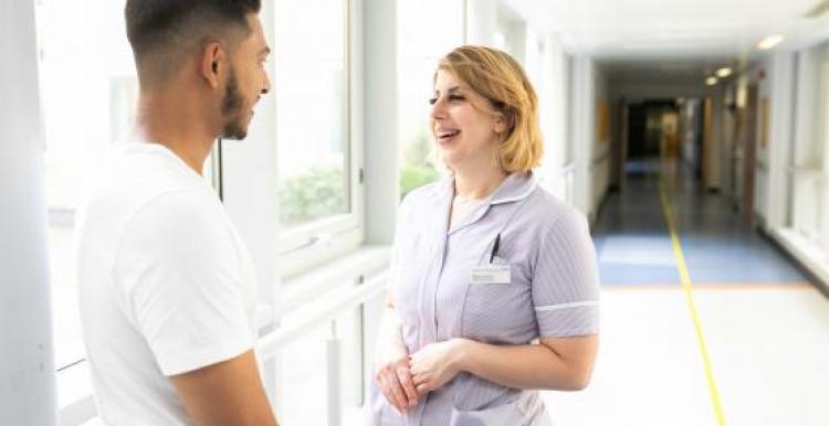 nurse and man talking nurse and man talking