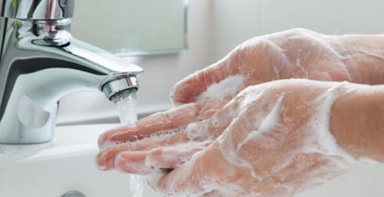 person washing hands person washing hands