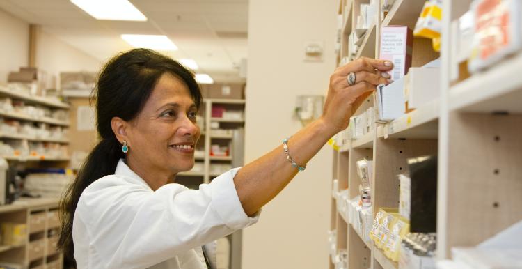 pharmacist at a pharmacy pharmacist at a pharmacy
